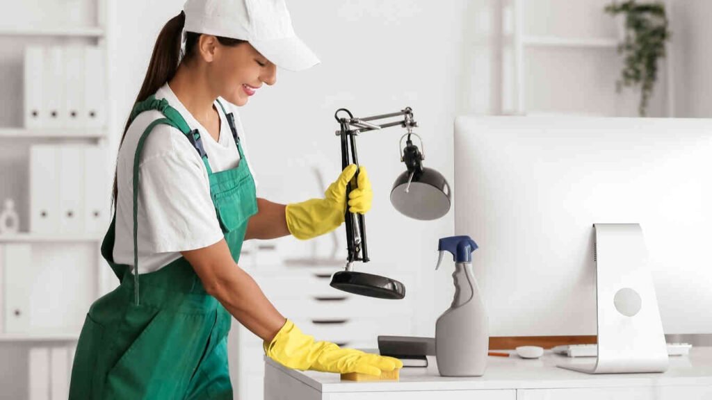 Professional team providing commercial cleaning service in Abu Dhabi office workspace.