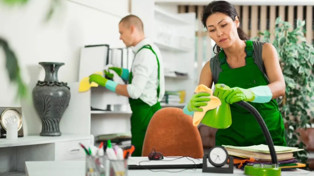 Commercial office cleaning team sanitizing office space in Yas Island