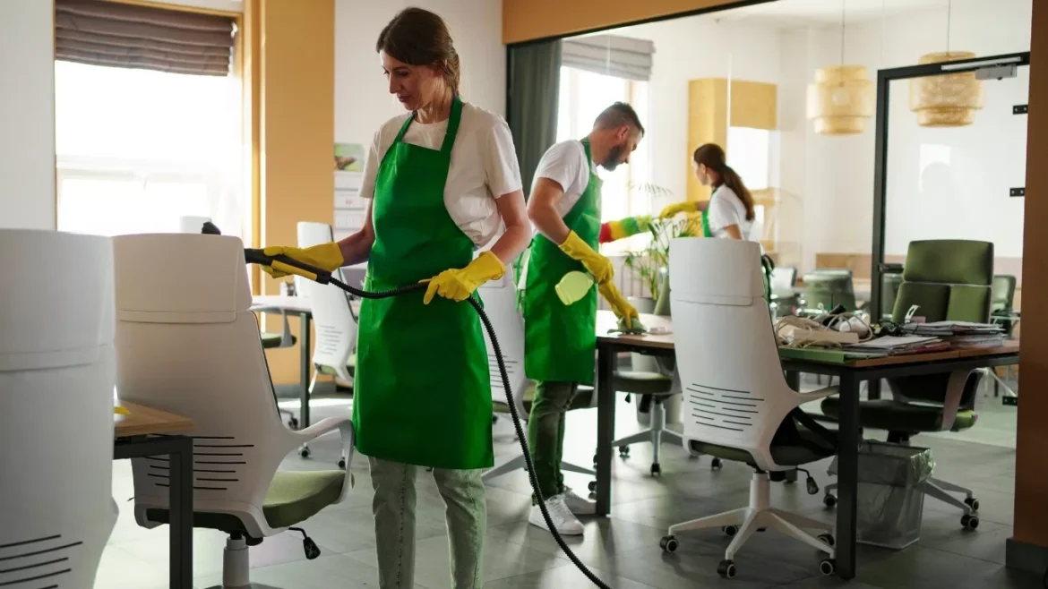 Commercial office cleaning team sanitizing office space in Yas Island